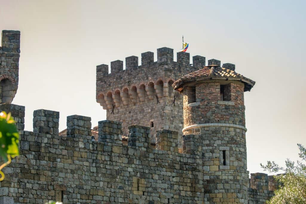 A tuscan-styled stone wall and turret found at the Castello di Amorosa. 